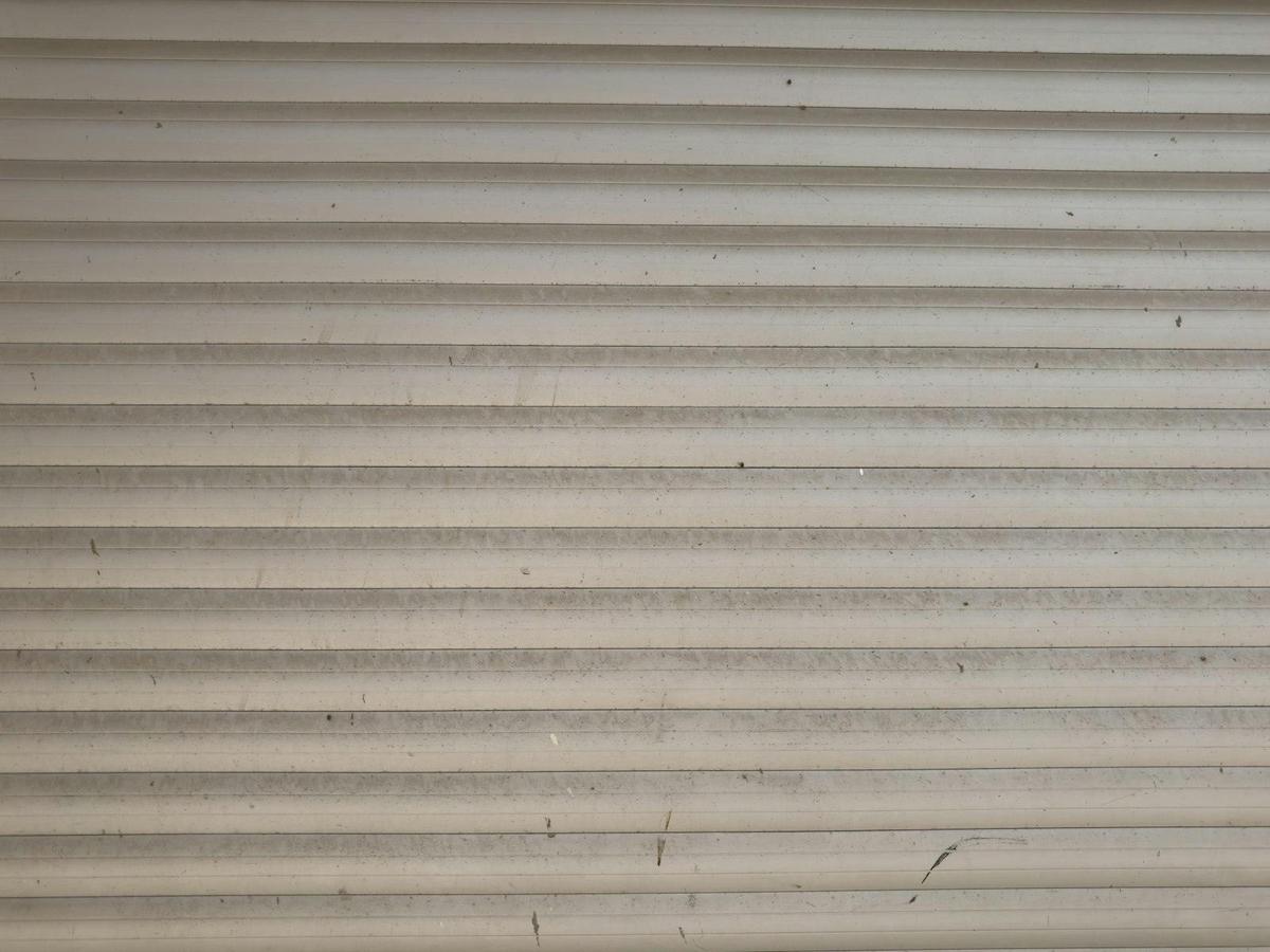 White window blind slats in soft light
